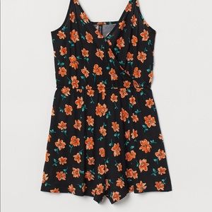Cute H&M romper with orange flower